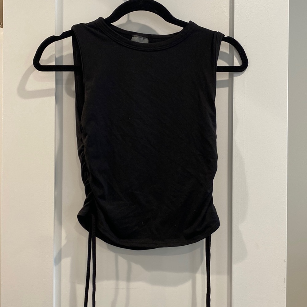 Never wore it! Stretchy crop top with adjustable sides